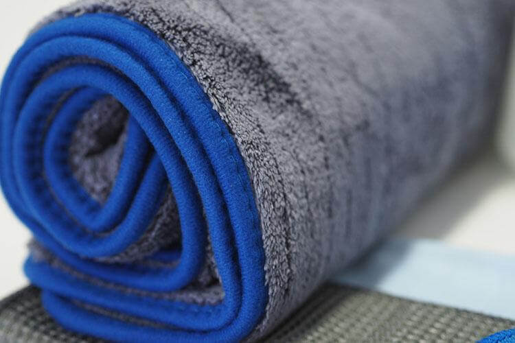 Close Up of Rolled Grey Drying Towel