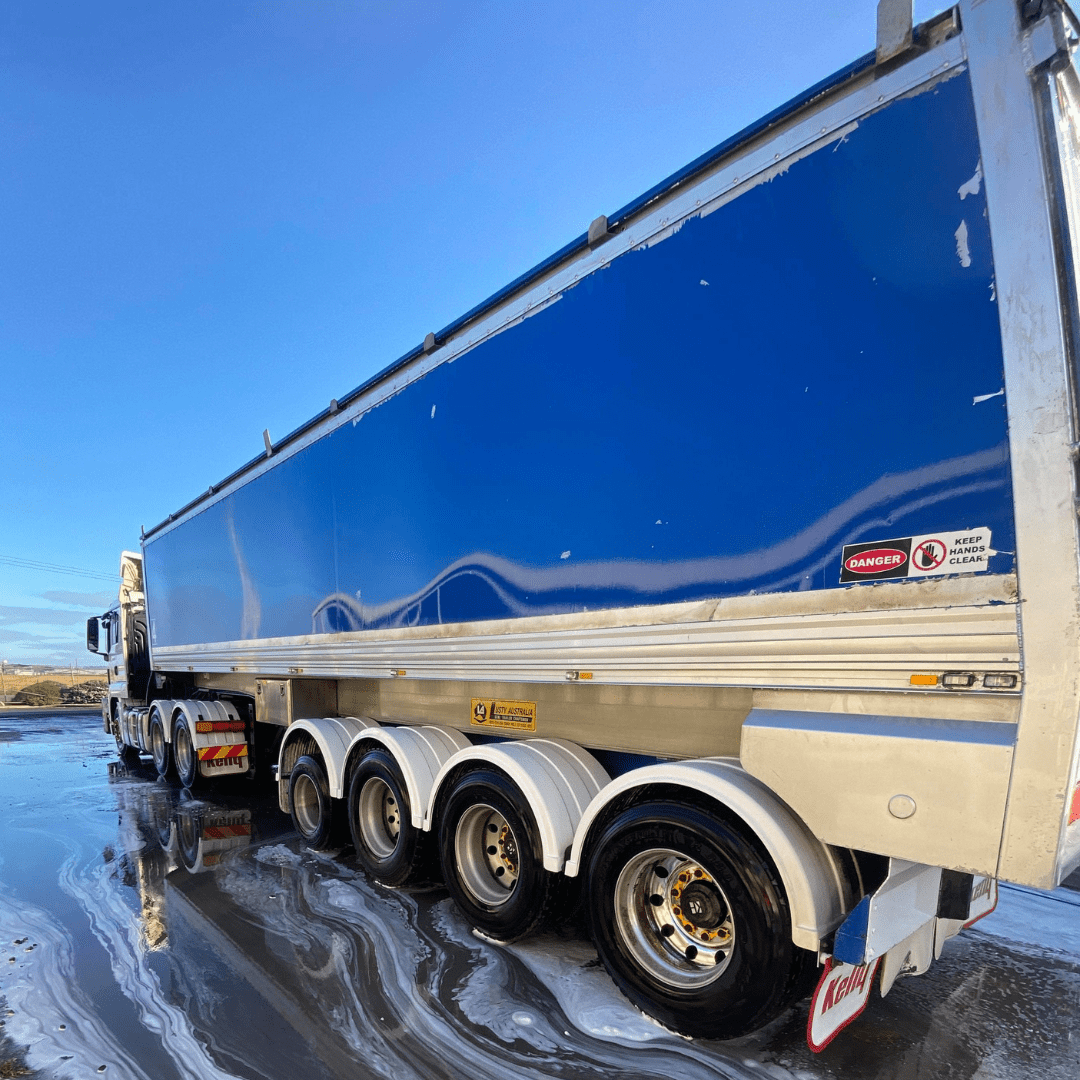 Side View of Clean Blue Road Truck
