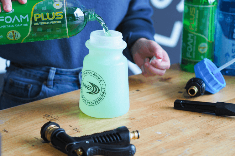 Green Foam Plus being Poured into Snow Thrower Applicator Bottle
