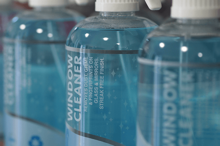 Closeup of 500ml Bottles of Blue Window Cleaning Product